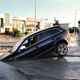 Illustration for article titled New Christchurch earthquake swallows SUV